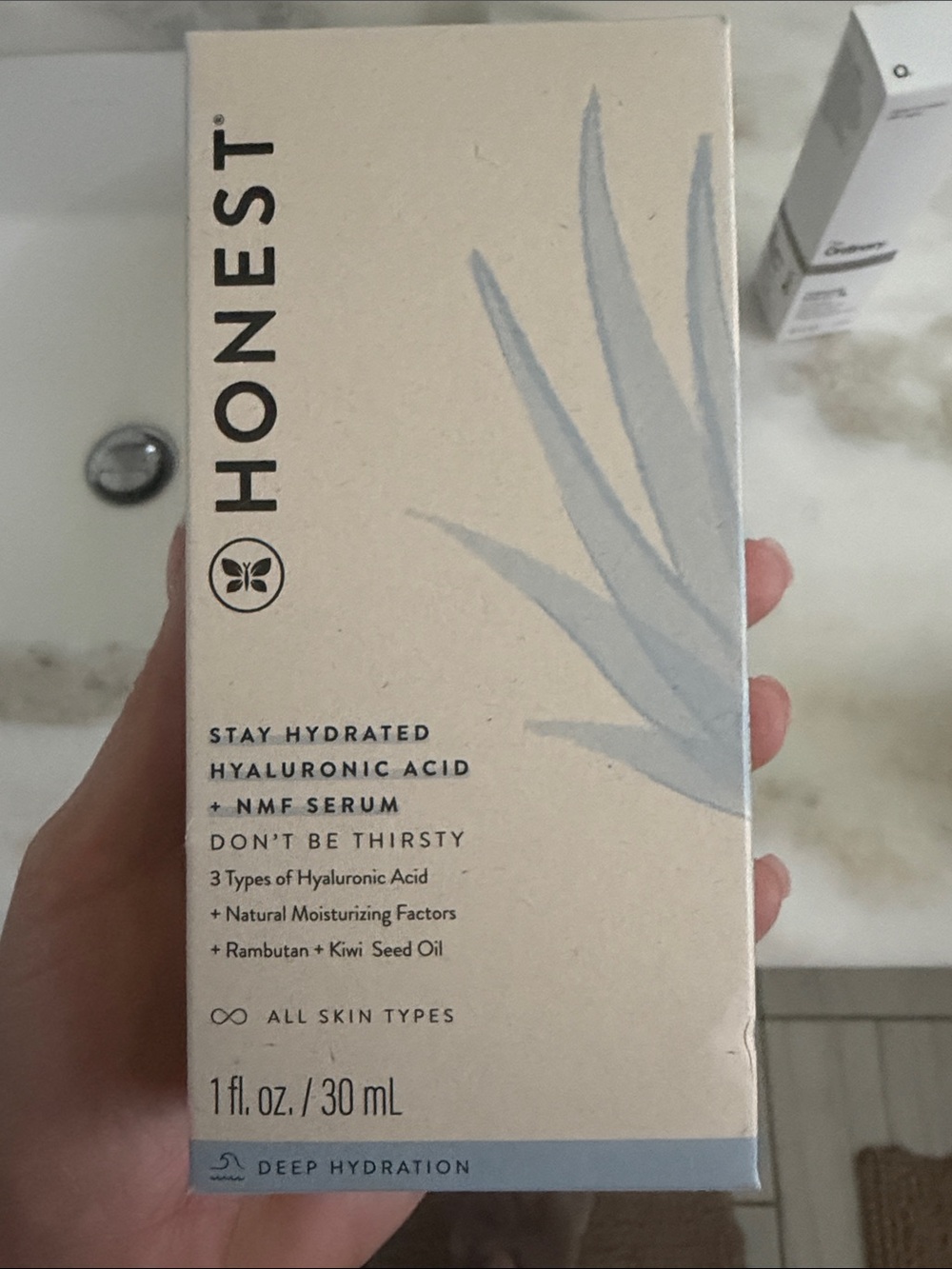 The Honest Company Hydrating Serum — Cream & Light Blue Packaging